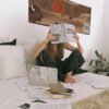 woman-reading-book-on-bed_White Bison woman-reading-book-on-bed_White Bison